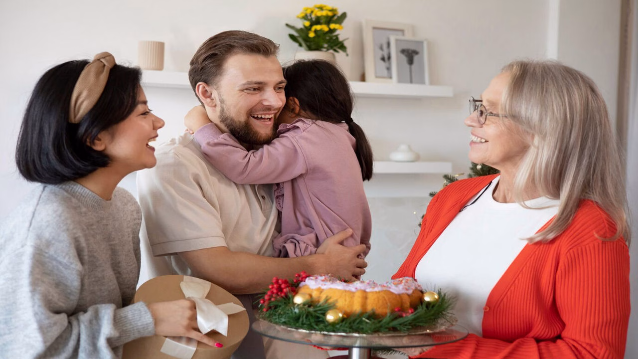 A family member handing Father’s Day wishes to their uncle with a smile