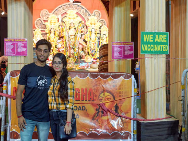 Couple exchanging Dussehra gifts with smiles and love